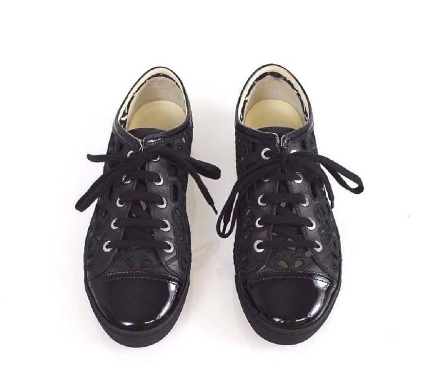 CHANEL Embroidered Floral Cutout Patent Leather Cap Toe Black Athletic Shoes In Excellent Condition For Sale In Miami, FL