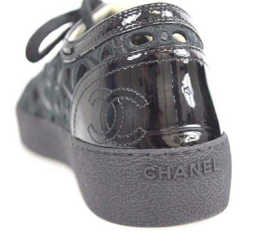 CHANEL Embroidered Floral Cutout Patent Leather Cap Toe Black Athletic Shoes For Sale 2