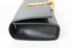 SAINT LAURENT Cassandre Black Clutch