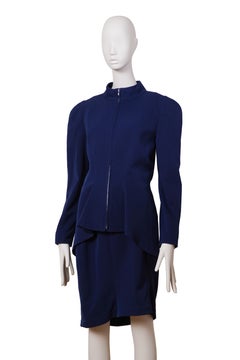 THIERRY MUGLER A/I 1989: tailleur scultoreo blu navy con chiusura a zip