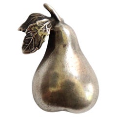 Broche vintage de plata de ley con forma de pera de los años 60