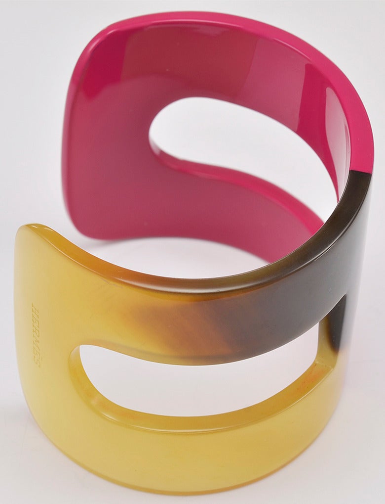 Gorgeous Hermes horn and fuschia lacquer cuff bracelet in new condition.