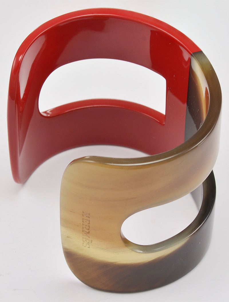 Stunning Hermes horn and red lacquer cuff in new condition.