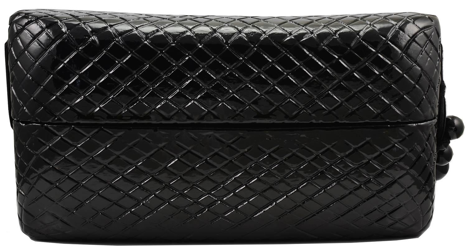 Perfect size black carved wood clutch by Raphael Sanchez. Pristine condition.