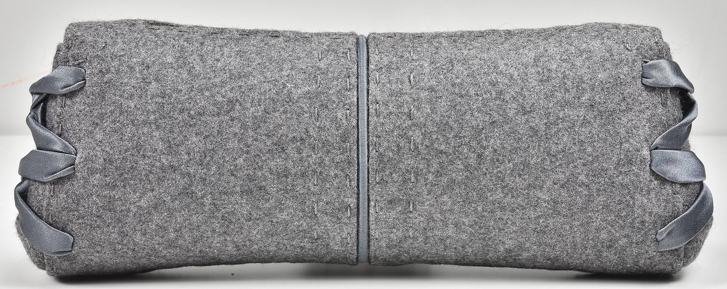 Gorgeous silk stitched VBH grey flannel clutch bag in pristine condition.