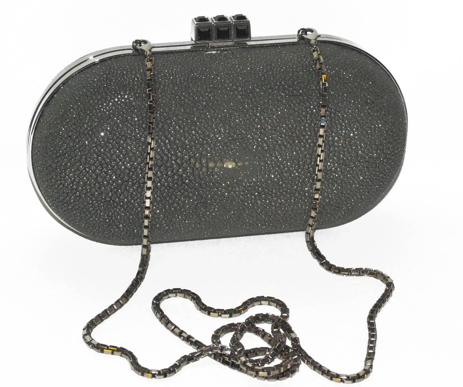 Chic black shagreen Judith Leiber clutch bag with shoulder chain.  Perfect for day or evening, in pristine condition.