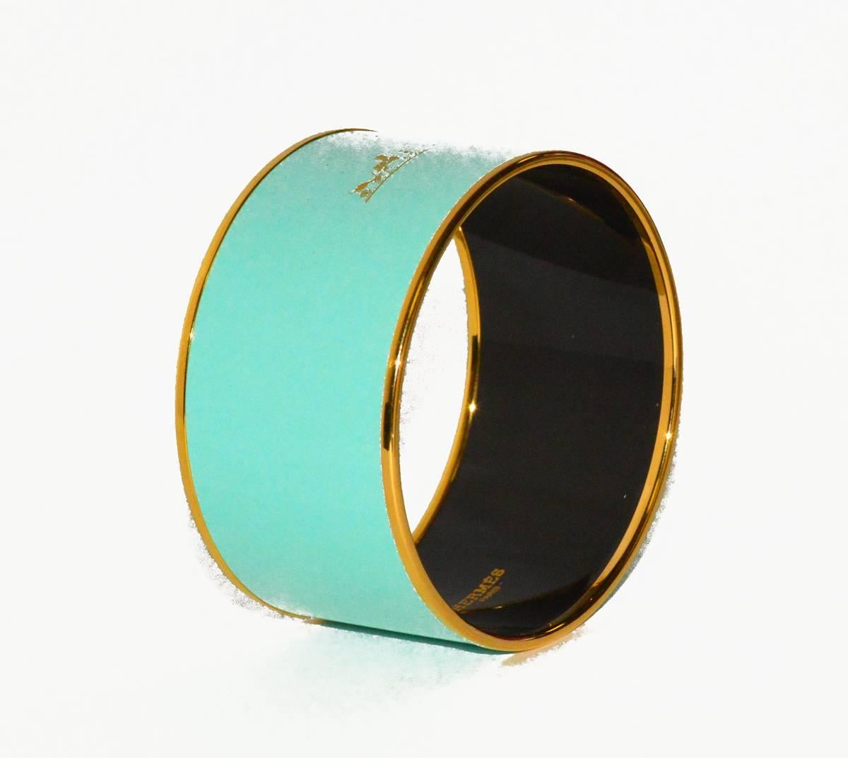 Great Summery Pop of Color! Turquoise enamel wide Hermes bangle in mint condition, new in box.