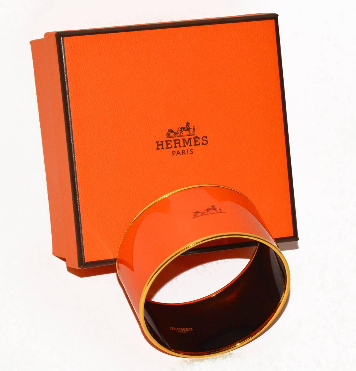 Nothing says Hermes like this chic, iconic, wide enamel bangle, perfect for summer or any time. Mint condition, new in box. Wear separately or stack with others. 