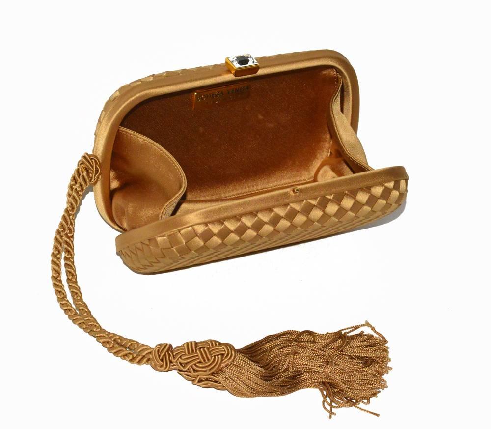 Lovely Bottega Veneta woven silk Knot clutch with tassel. Excellent condition. All year round color.