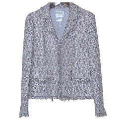 Iconic Chanel Boucle Suit with Matching Shawl.