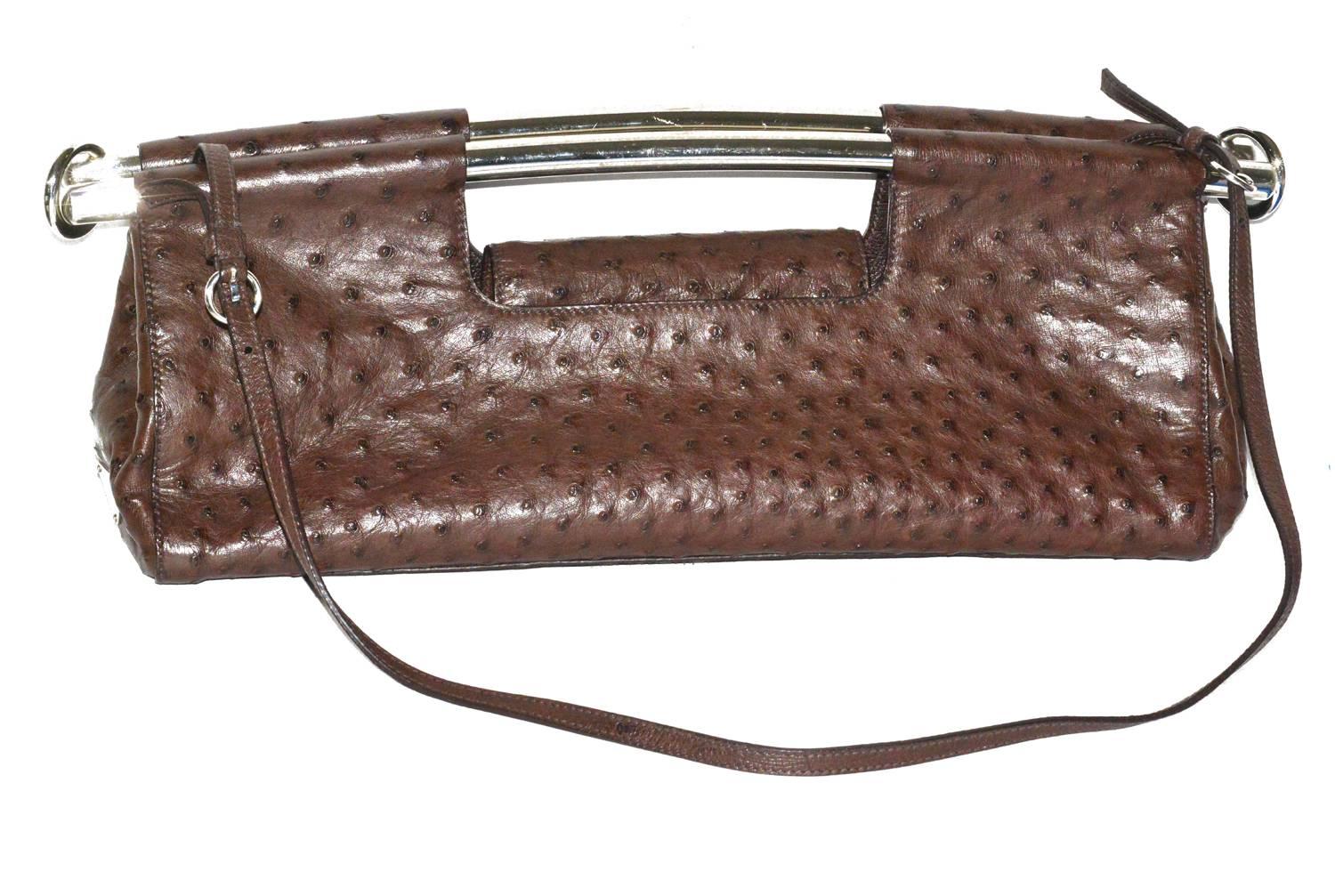 Fabulous Prada ostrich handbag with detachable shoulder strap. Pristine condition, rare bag. Measurements are:  16 in. x 7 in. x 3 in.