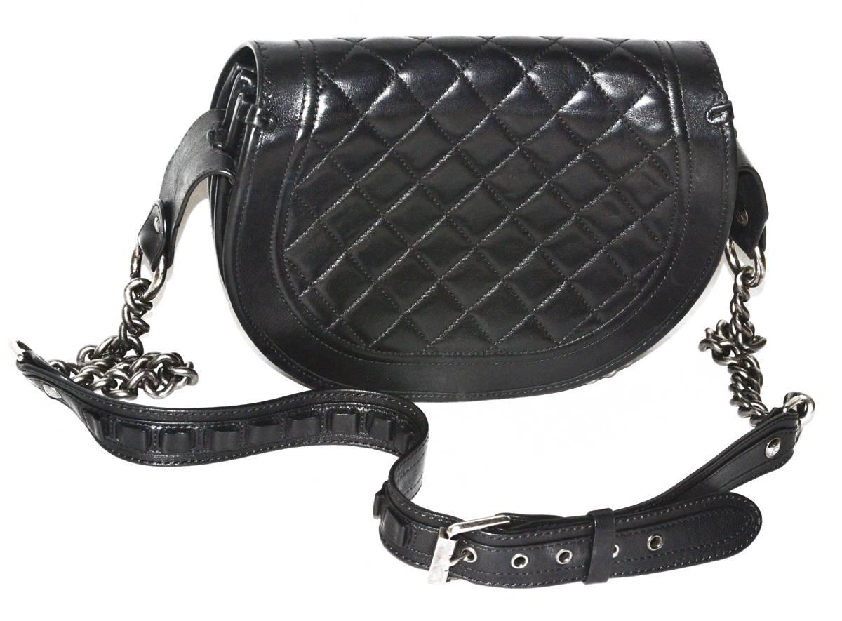This is a rare find...FABULOUS Chanel 2014 runway Texas-inspired bag of the Chanel Metiers d'Art. Black leather and fur cross body bag.  This absolutely pristine and amazing bag.