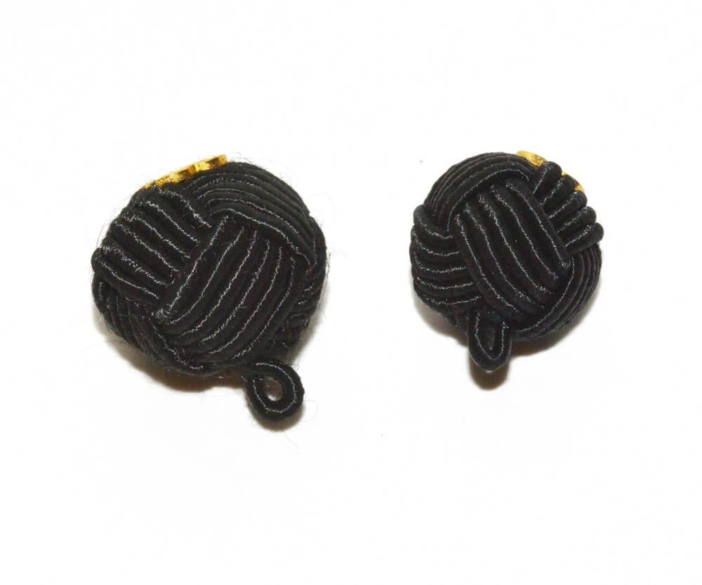 Set of 8, 2 small and 6 large, Chanel interwoven silk rope and gold tone logo buttons in mint condition.  Never used.