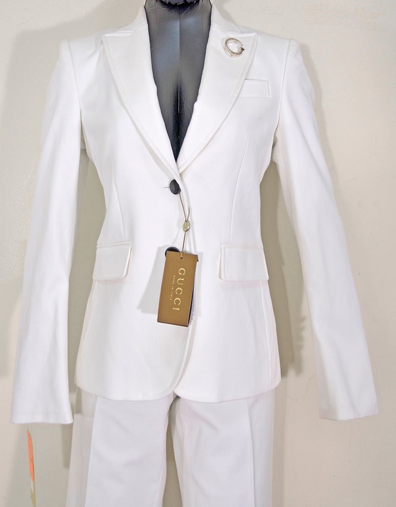 The Perfect Suit! White Gucci man tailored suit size 44. In excellent pre-owned condition. 

All proceeds from the POSH Sale benefit Lighthouse Guild, the world-wide leader in helping people who are blind or visually impaired as well as those with