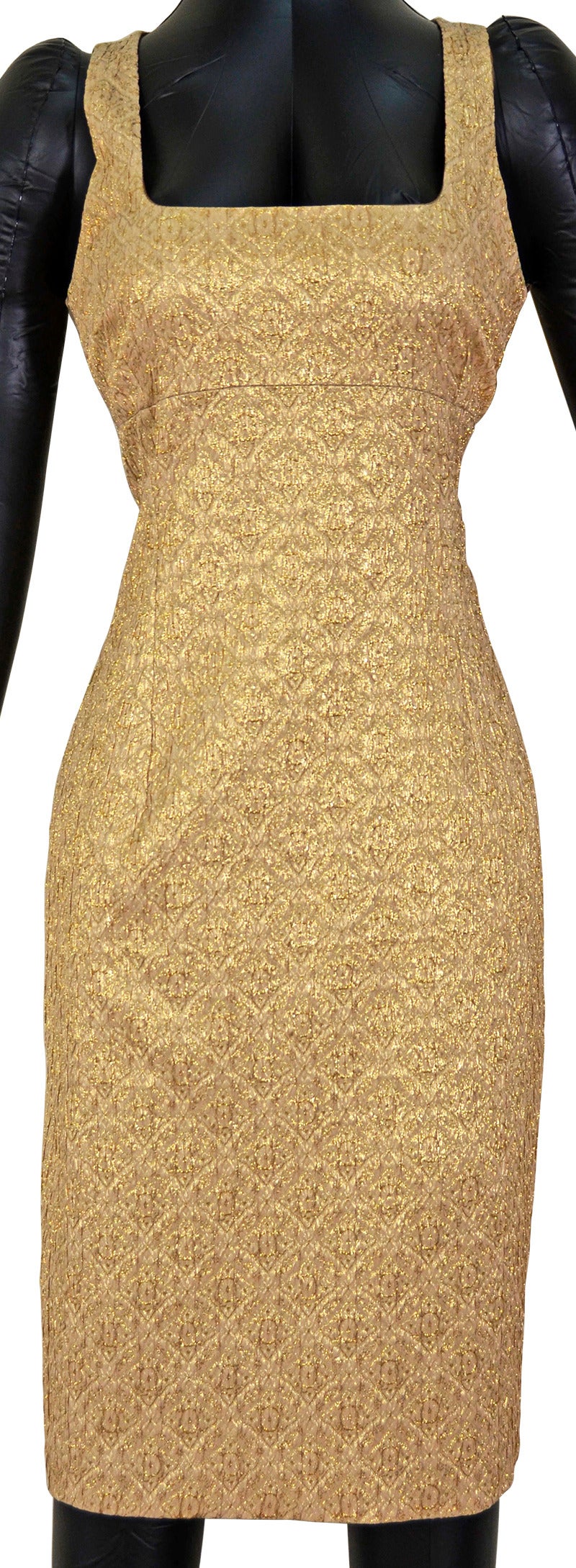 Gorgeous Michael Kors Otaluan made ensemble. Gold dress and matching fiat, size 8. In excellent condition. Perfect for that special occasion, any time of year.