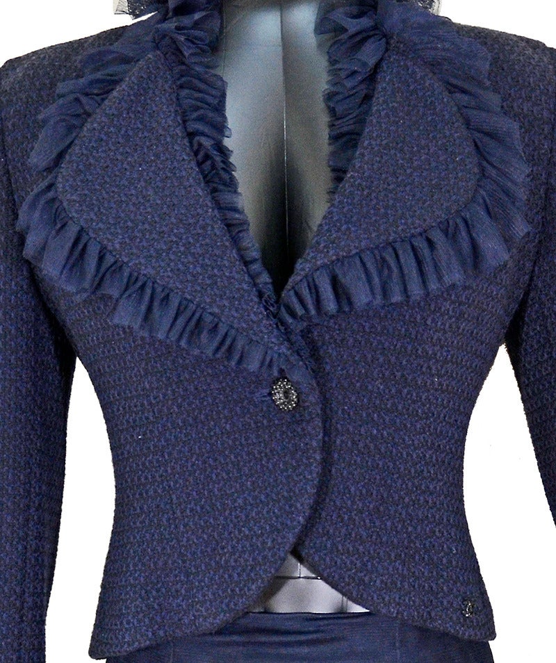 Stunning Chanel navy skirt suit, size 4. Excellent condition.

All proceeds from the POSH Sale benefit Lighthouse Guild, the world-wide leader in helping people who are blind or visually impaired as well as those with multiple disabilities or