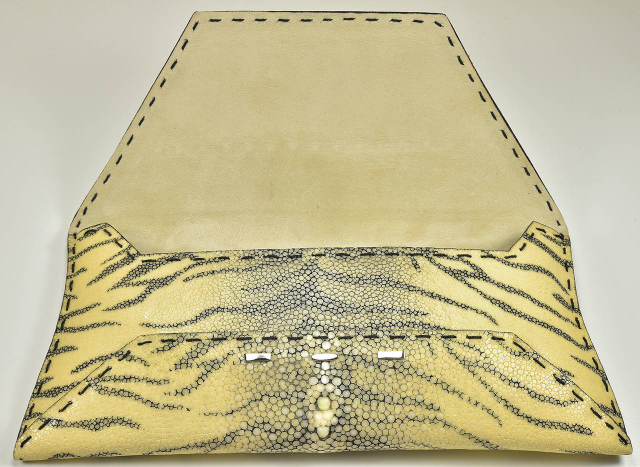 Outrageous tiger stingray clutch by VBH. Gorgeous pop of color to finish any outfit, any season! Pristine condition.