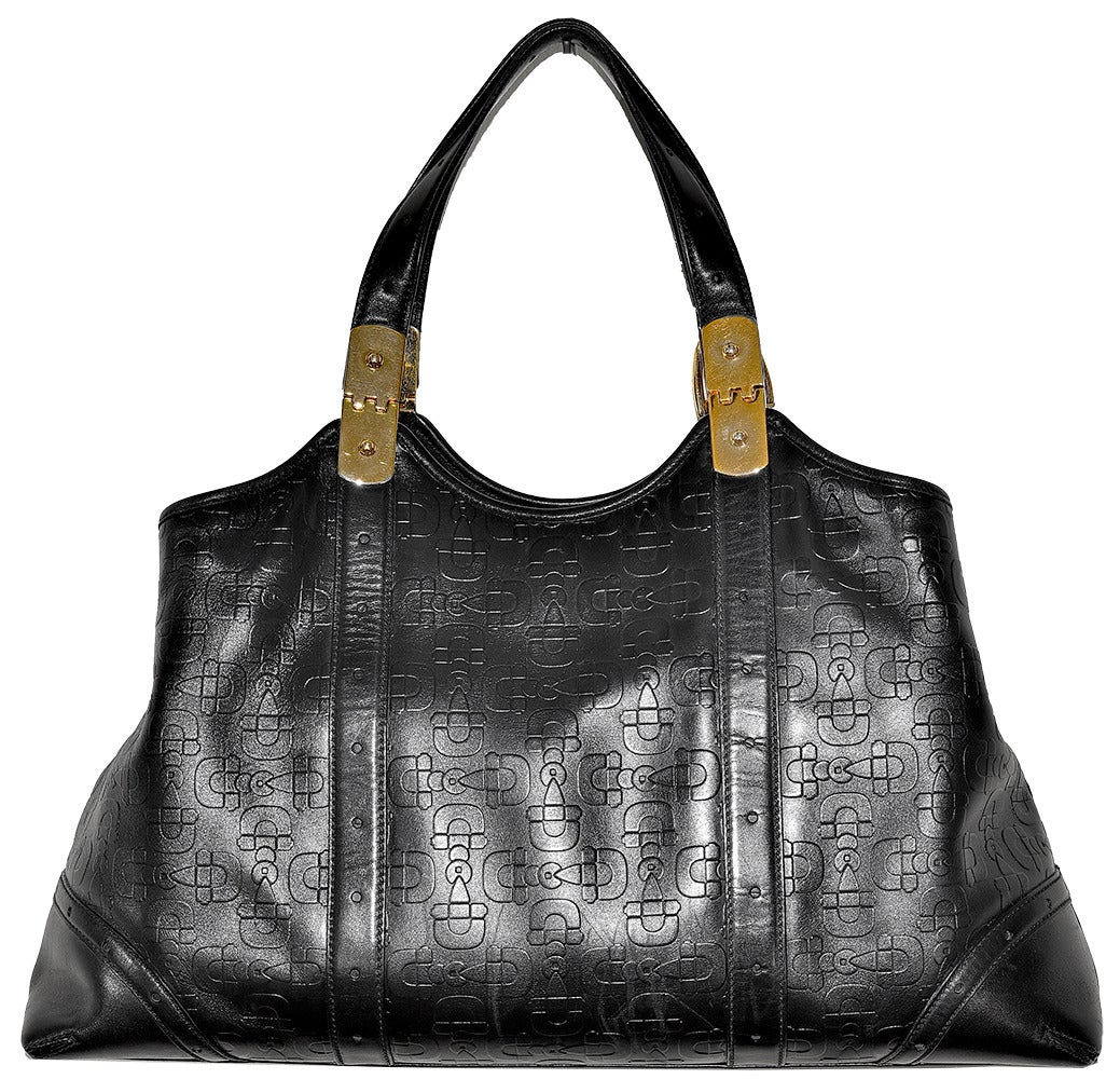 Huge iconic Gucci black leather signature shoulder bag with horse bit imprints in pristine condition.

All proceeds from the POSH Sale benefit Lighthouse Guild, the world-wide leader in helping people who are blind or visually impaired as well as