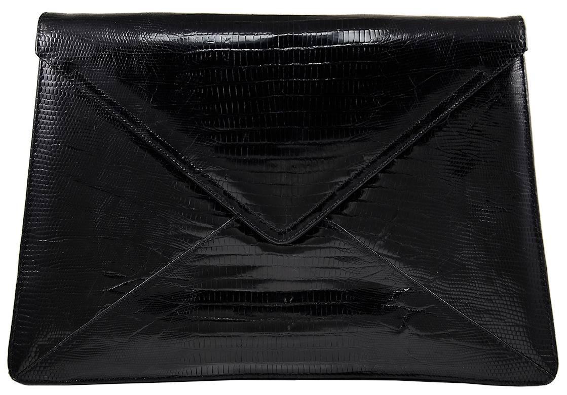 Classic Susan Bennis day/night black lizard bag.  Clutch bag...perfect for every occasion. Excellent condition.