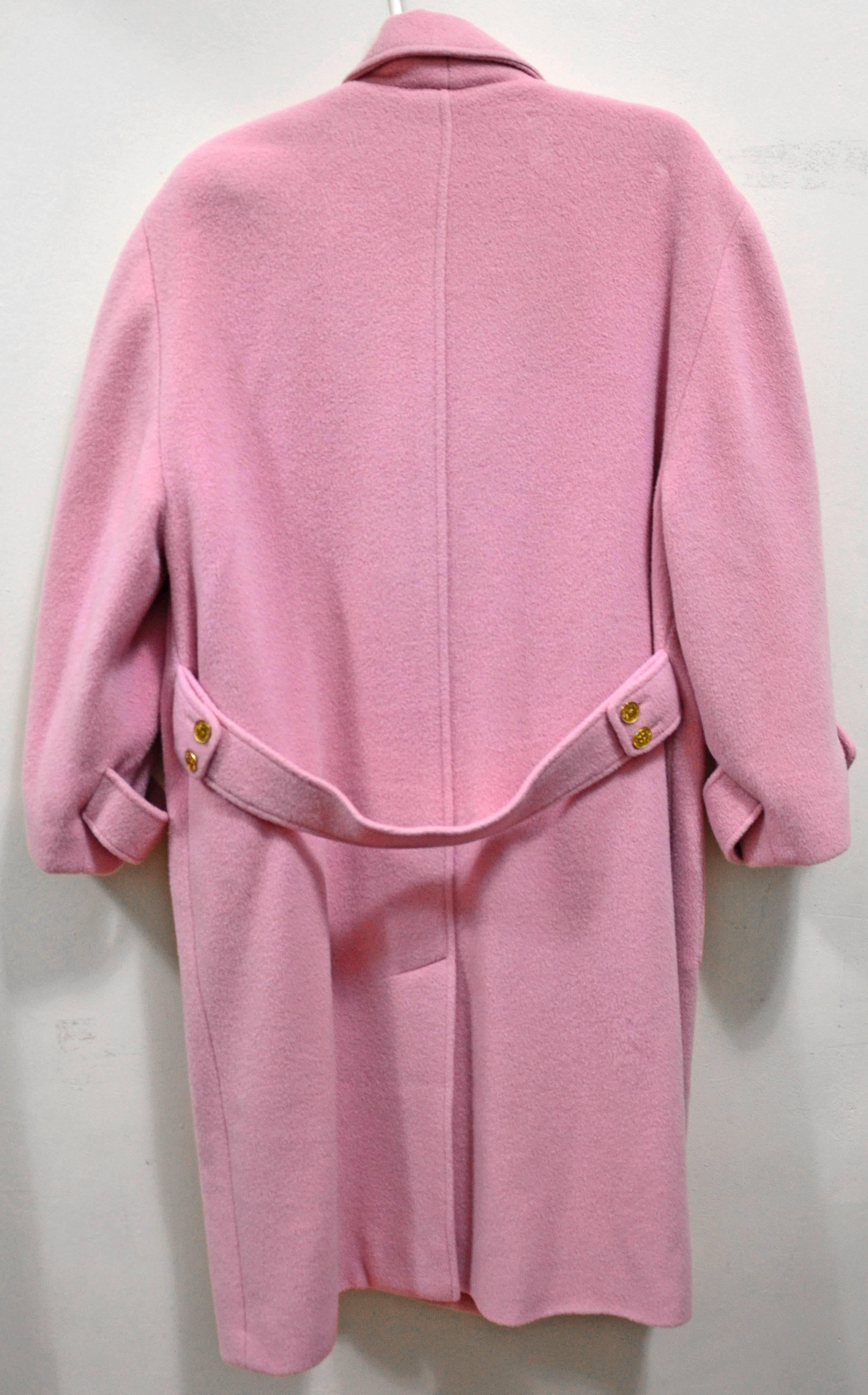 Baby, it's cold outside!!! How fabulous, this gorgeous pink Chanel coat in pristine condition.  Size label was removed, but will fit up to a size 12 comfortably. What a fantastic color to brighten the dreary winter days!!!