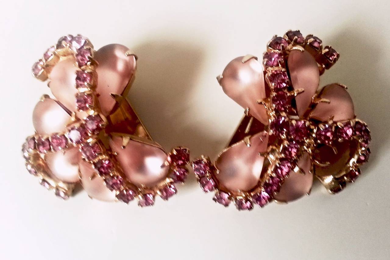 Exquisite and highly collectable vintage 1950s earrings made for Wallis Simpson.

I have rarely seen such a beautiful pair of earrings and small wonder. Fashioned from luminescent pink frosted glass and diamond-cut Austrian crystals they were