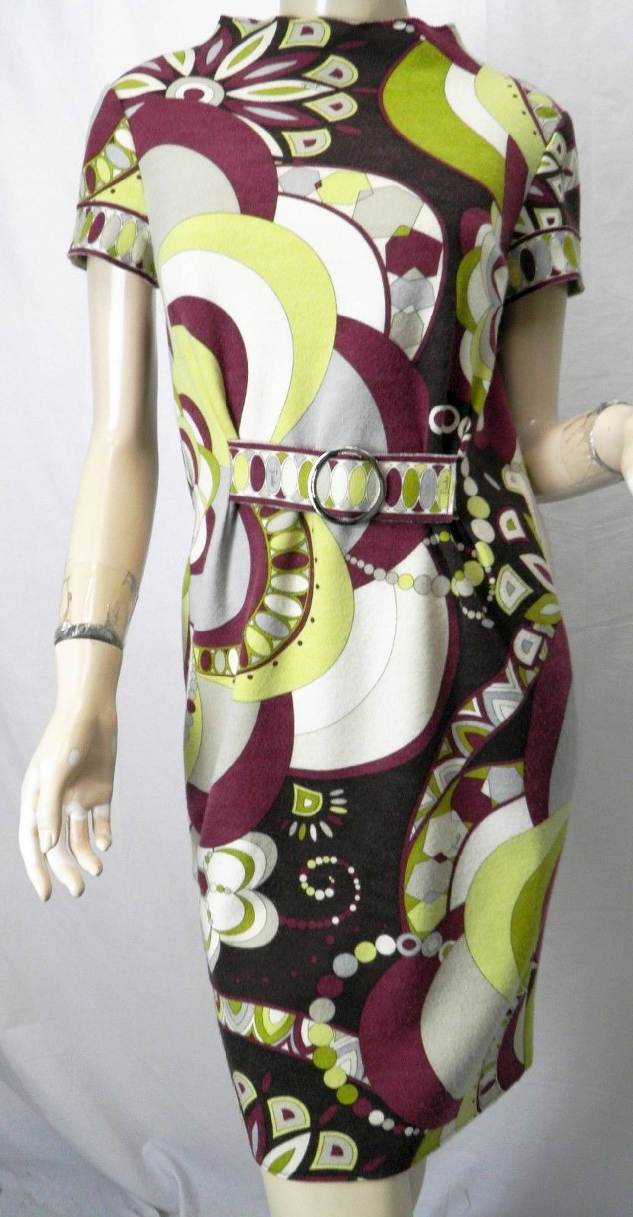 A wonderful Emilio Pucci wool, cashmere and silk runway dress designed in 1997. Size Small to Medium.

The iconic print, which is from the Pucci archives of 1965 (thought lost, but re-discovered in 1996) is a mixture of burgundy, yellow, pale blue