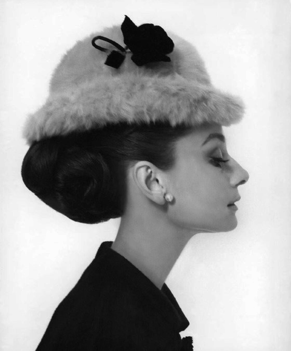 A wonderfully chic late 50s Christian Dior hat in a beautiful rich brown mink that was modelled by Audrey Hepburn for Harper's Bazaar with a flower brooch (see photograph.)

It is also reminiscent of the iconic mink bucket hat Hepburn wore in