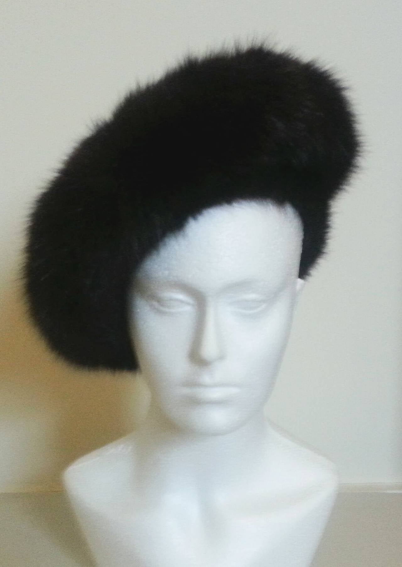This is a very rare Chanel couture dark brown mink beret hat from Karl Largerfeld's first Autumn Winter Collection for the House of Chanel in 1984. 

The mink is extremely high quality with no shedding or patches. The detachable bow is made from