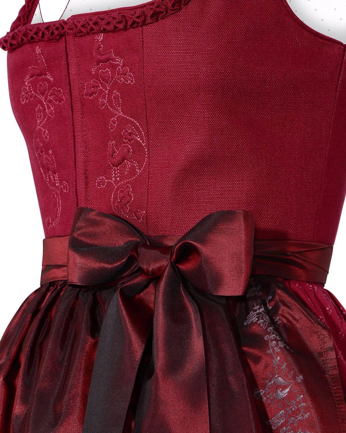 According to the New York Times, 'the dirndl is the new fashion must-have.' US Vogue has described it as 'the most flattering dress a woman can wear.'

I am delighted, therefore to offer this wonderful burgundy dirndl dress by Lodenfrey of Munich,