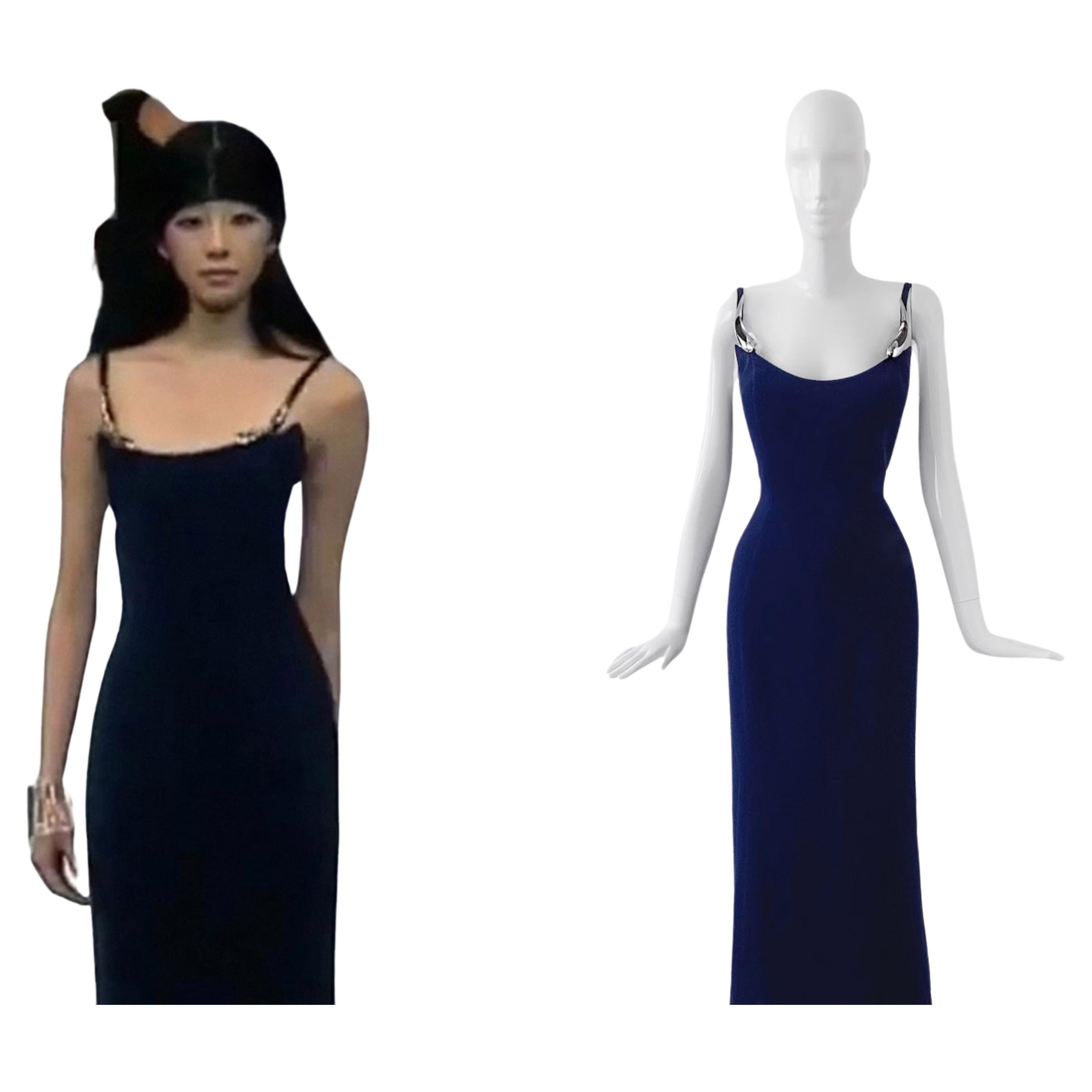 
Museum worthy collectors piece.
Absolutely gorgeous documented Thierry Mugler dress, Spring Summer 1999 Collection. Documented on the runway as well as on the iconic portrait of Manfred Thierry Mugler in his studio. Dark Blue long evening gown with