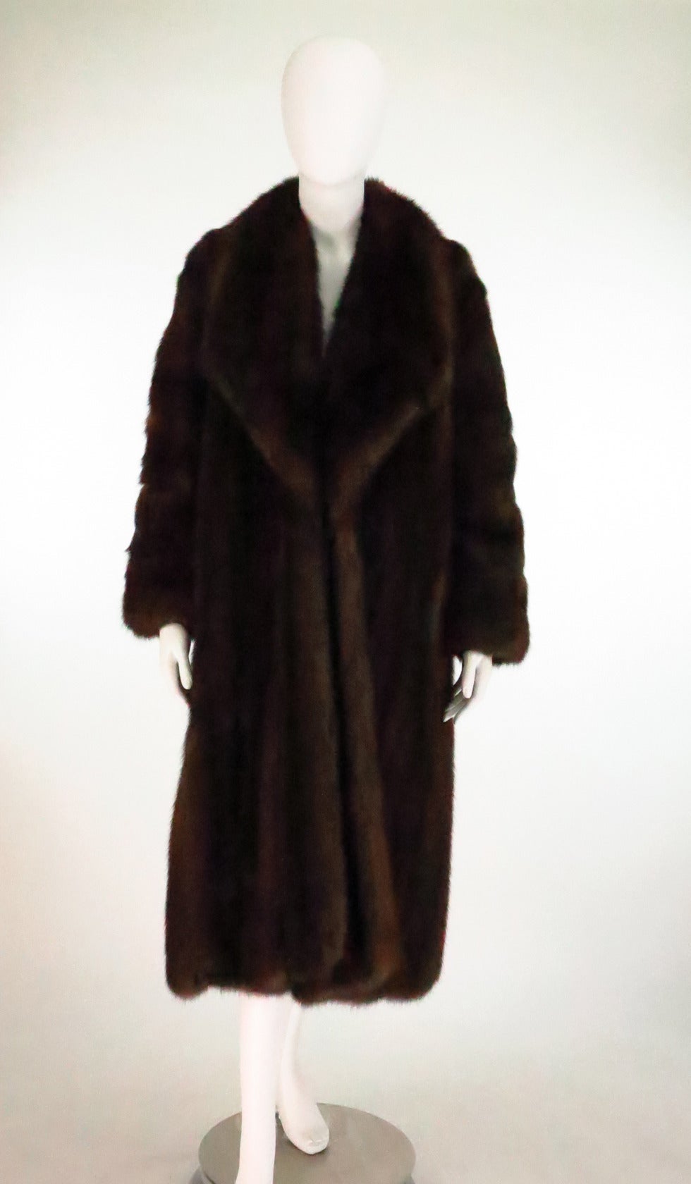 Luxurious Russian sable coat Designed by Giorgio Armani for Neiman- Marcus...This gorgeous coat is in excellent condition with full thick fur and shimmering guard hairs...Featuring a deep wide collar, long full sleeves with the fur worked