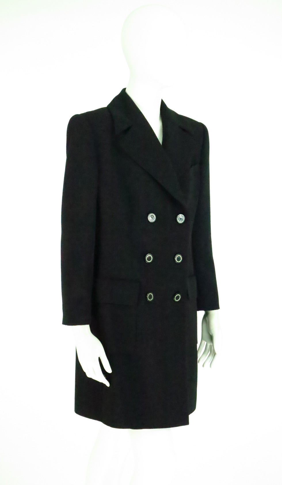 Valentino Black wool (fine corded wool, feels like silk) double breasted evening coat...Notched collar coat has a single angled banded breast pocket, there are two hip flap front pockets...Double breasted closes with black rhinestone trimmed