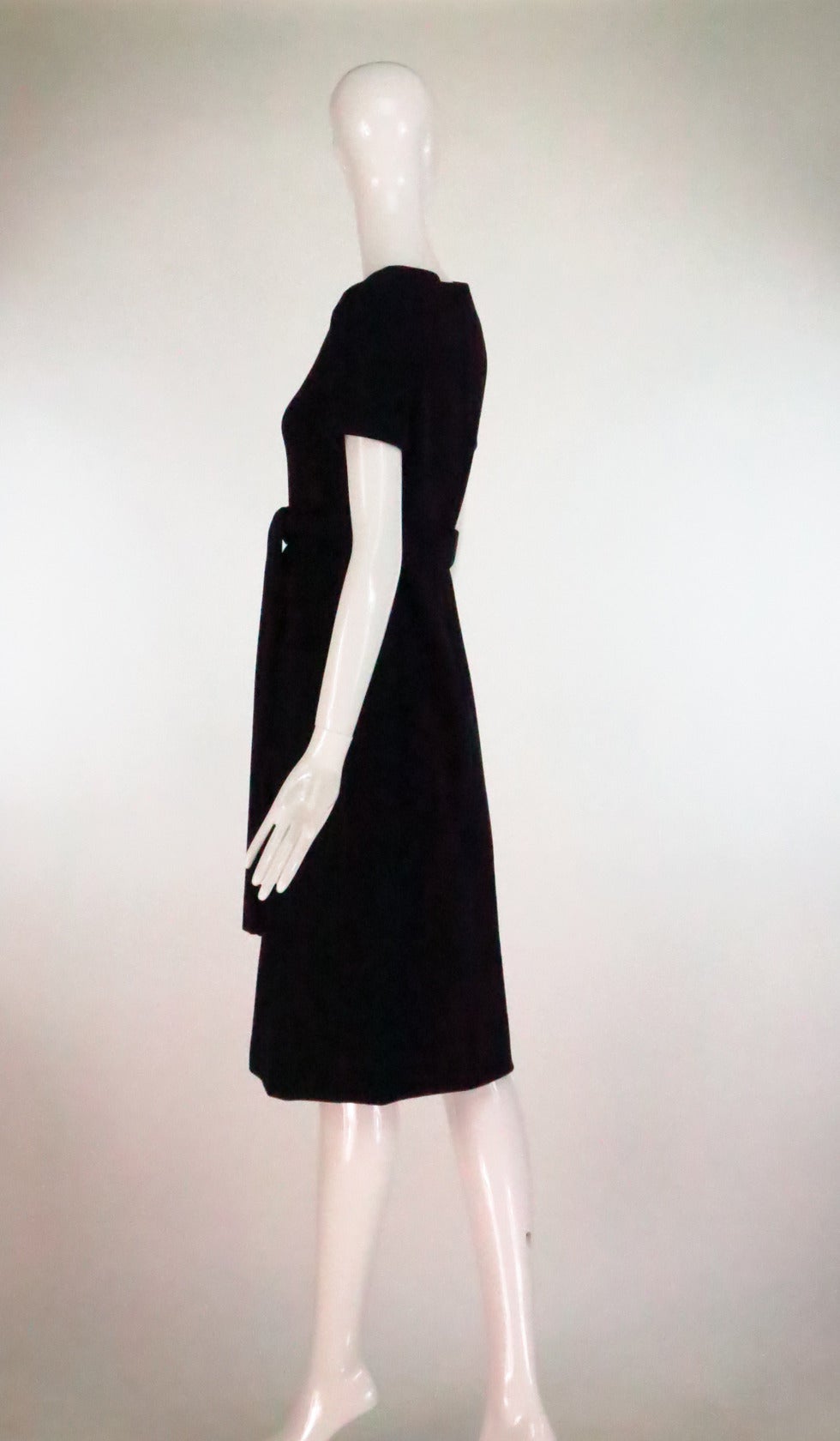 Rare Norell-Tassell label black wool high waist patch pocket dress In Excellent Condition In West Palm Beach, FL