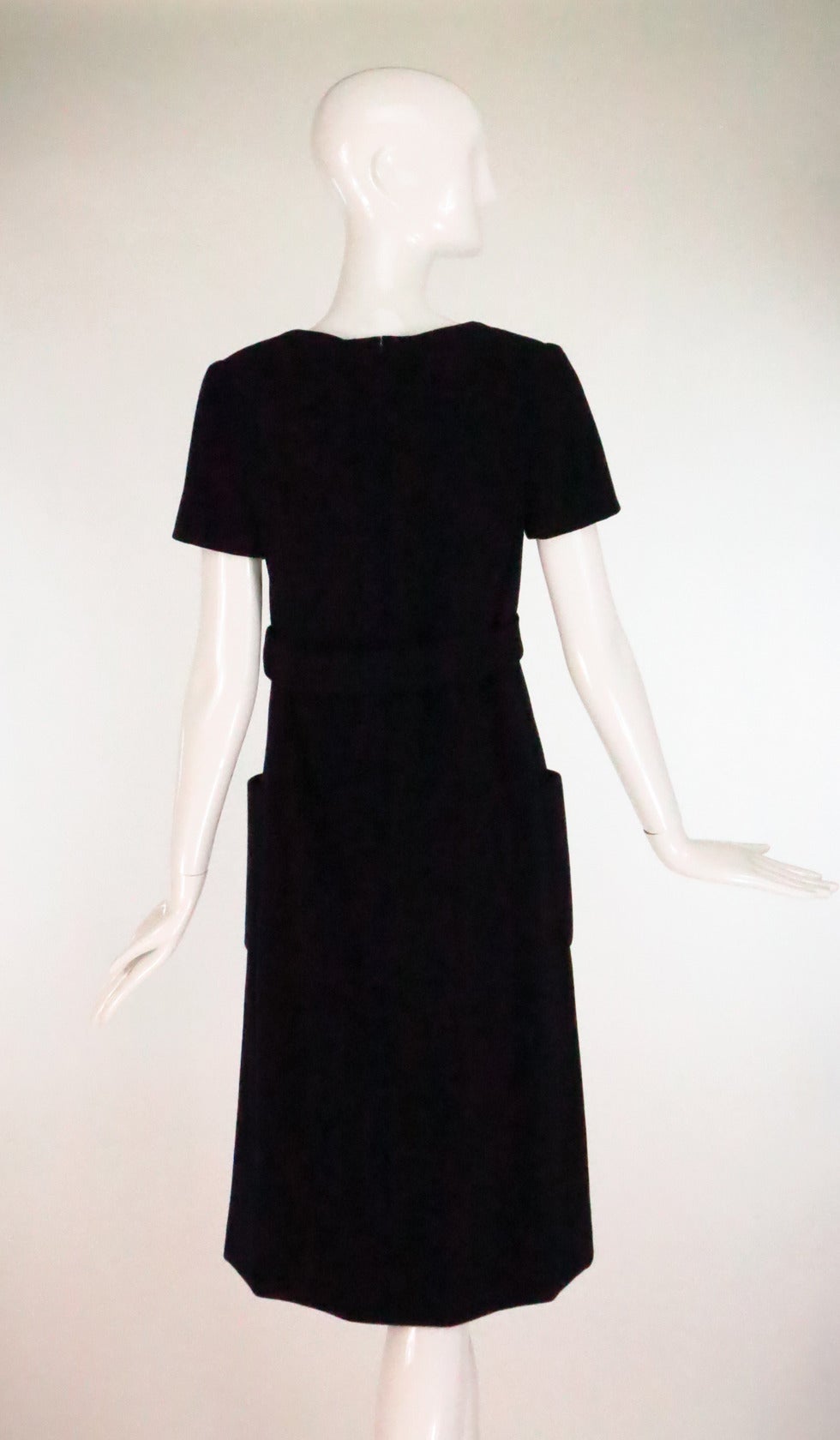 Rare Norell-Tassell label black wool high waist patch pocket dress 1