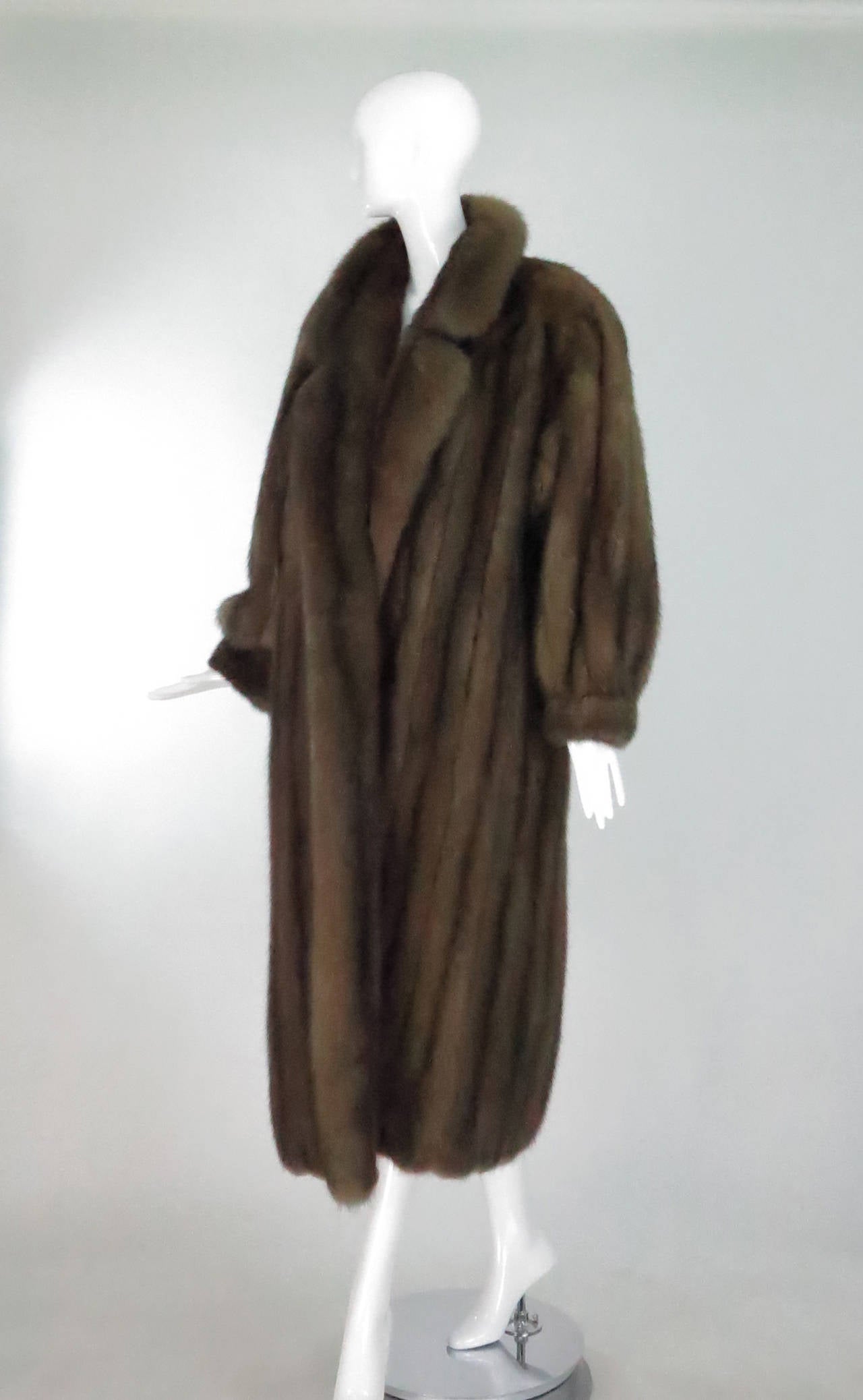 Gorgeous full length sable coat from Saks Jandel, Washington DC...Deep rich fur is full and shimmery, the skins are supple...Classic style with notched collar, full sleeves that are gathered into cuffs to keep the cold out...Coat closes with hooks