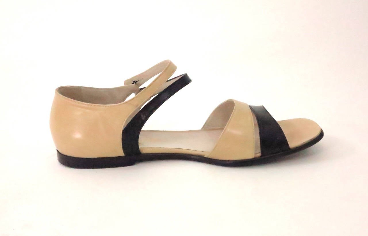 Chanel tan & black soft leather sandals size 39 1/2...Double front straps button at the side front...Double straps at the front...In excellent condition...