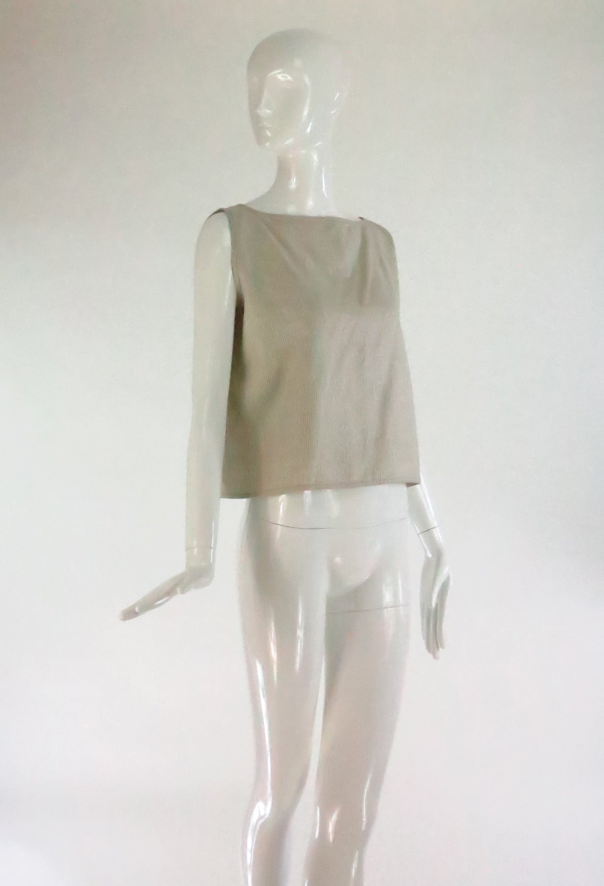 Zoran pinstripe tank top in cashmere and silk...Cream with a pale gray/blue stripe...Cropped, sleeveless top...Never worn...Original price $450...OS

Please check the measurements provided below and compare with your own measurements for the best
