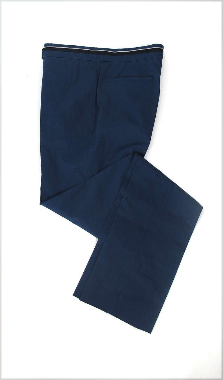 Hermes mens St Germain new with tags khaki navy blue casual trousers...Banded mesh and twill waist band with loop over & snap closure...On seam side pockets, back banded pockets...Fine serge cotton in navy blue...These have not been