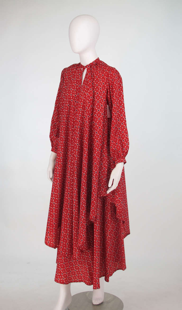 1970s Julio New York silk floral tunic & skirt...Julio was one of those chic little boutiques that New York City was famous for back in the 1970s, I believe it was located in the east 70s...This 2pc set has a Provencal silk print in a deep brick red