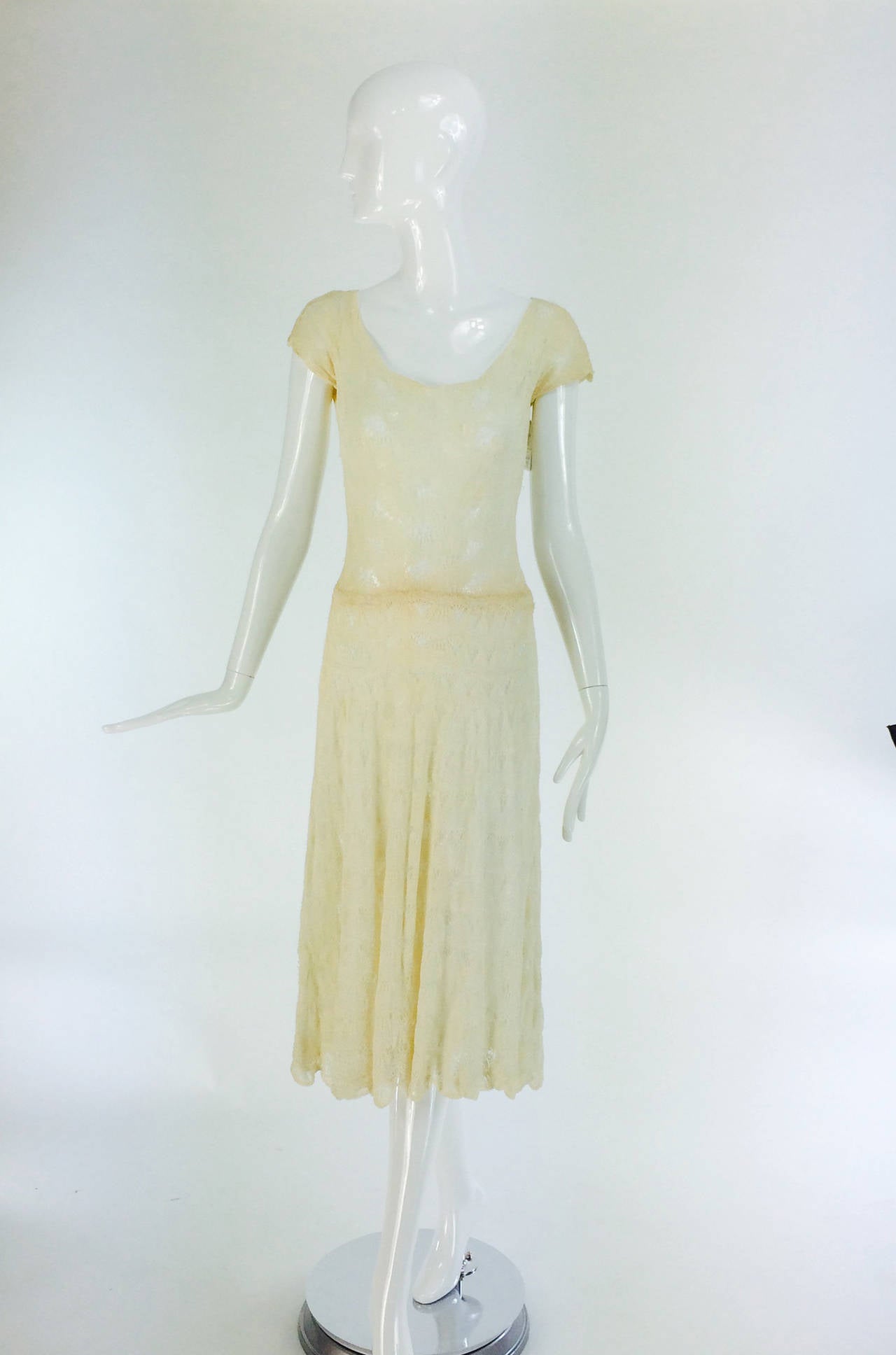 Ivory cotton crochet dress from the 1930s, labeled Aida Woolf, 20 Grosvenor St, Mayfair London W1...Aida Woolf designs can be found in the collection of the  Victoria & Albert museum London...From the 1930s a beautiful hand crocheted day