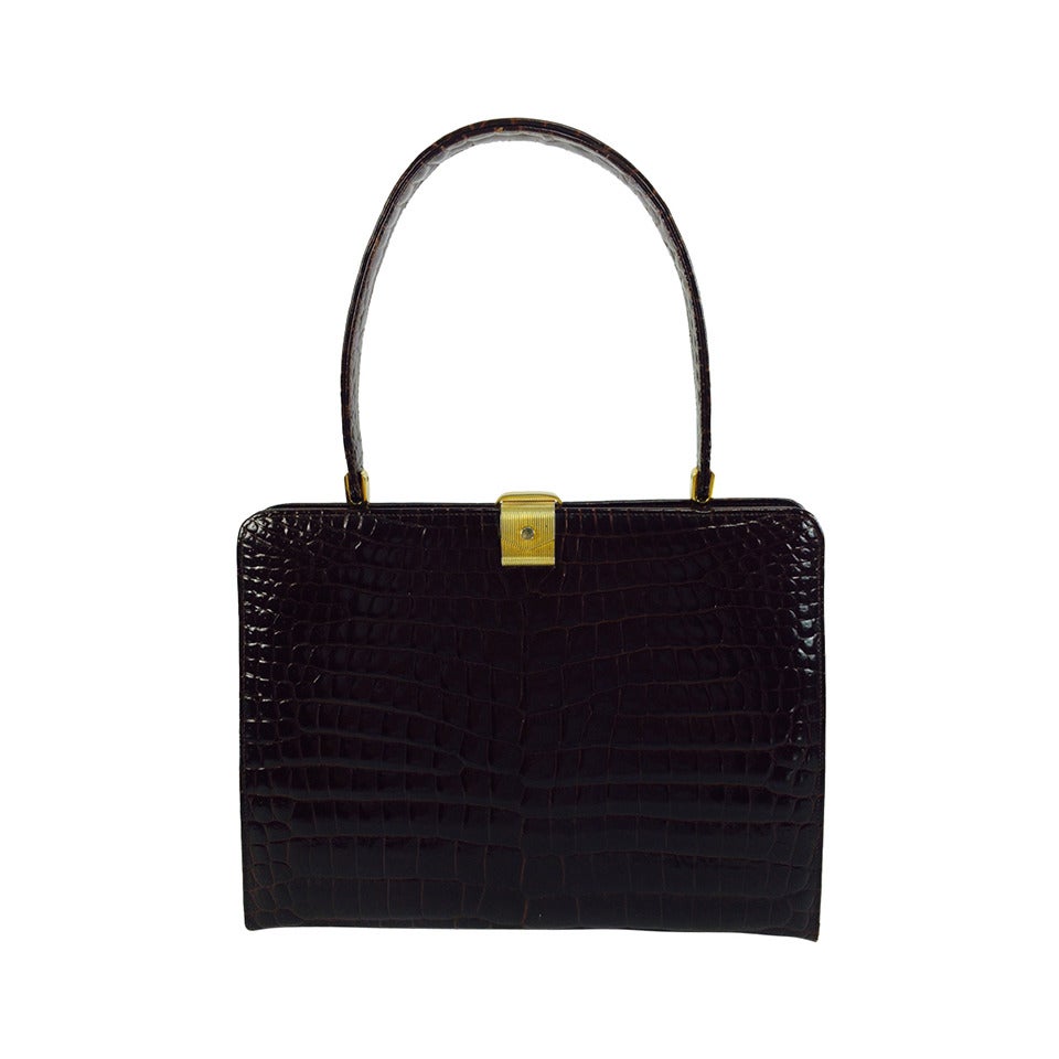1960s Dofan chocolate brown glazed alligator handbag