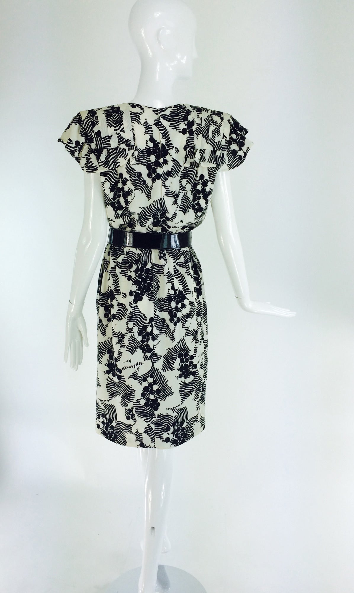 Women's 1990s Andre Laug black & white silk ruffle shoulder dress