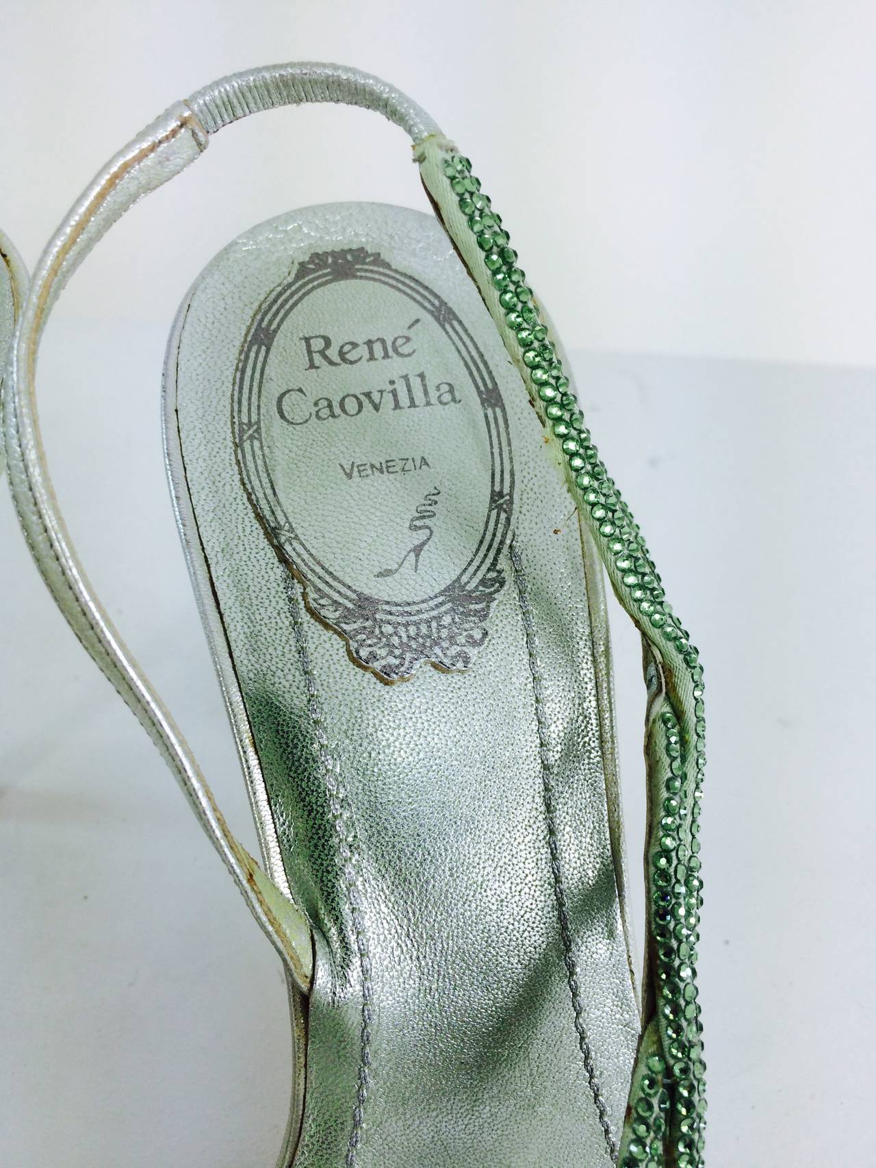 Rene Caovilla, mint green pave rhinestone set strap, high heeled sandals, mint green metallic heels, with silver lame trims...marked size 39...In very good barely worn condition.