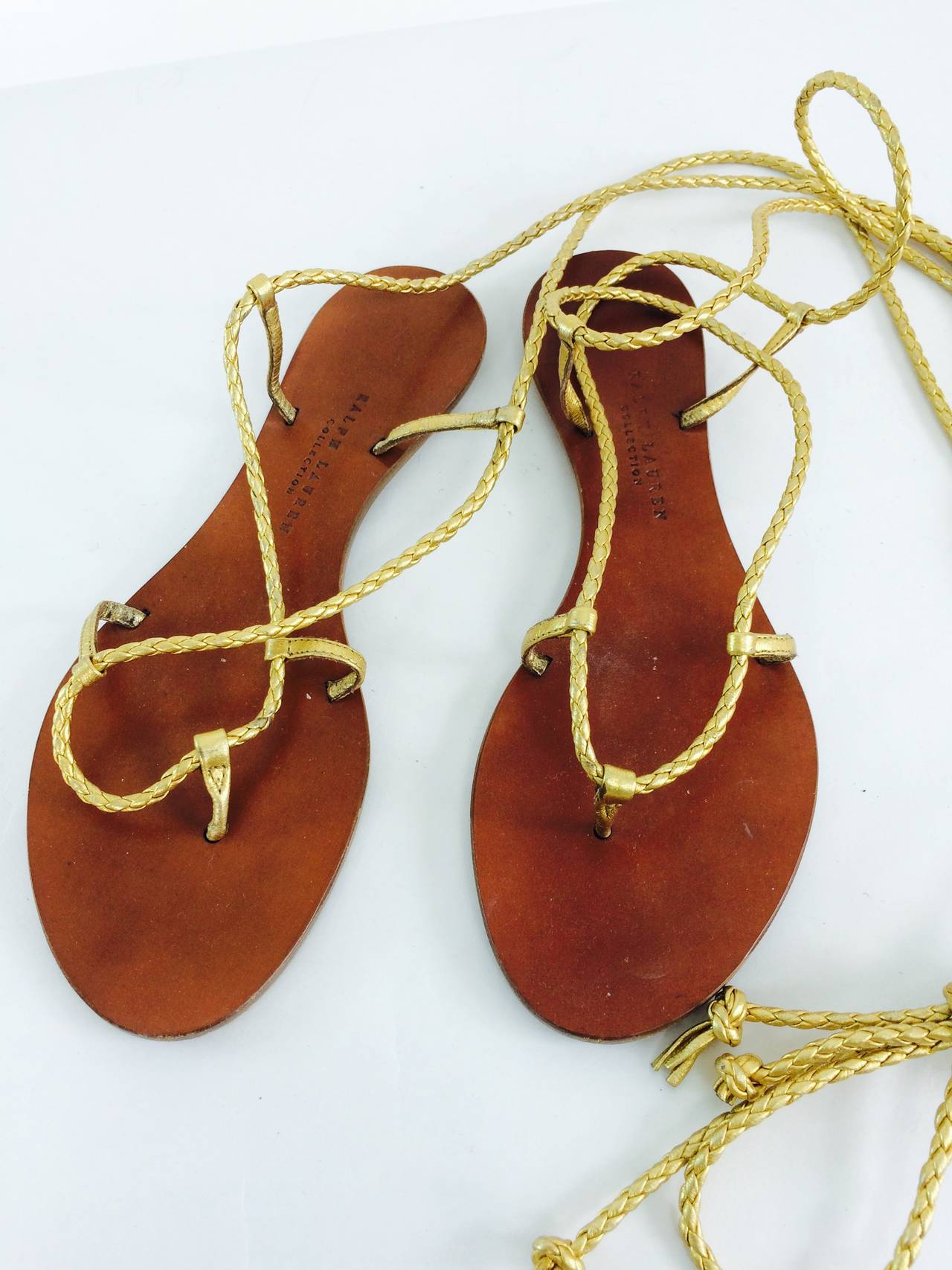 Ralph Lauren Collection gold leather gladiator thong sandals, leather soles, braided gold leather cords and laces  6 1/2 B, in excellent condition with some sole wear
