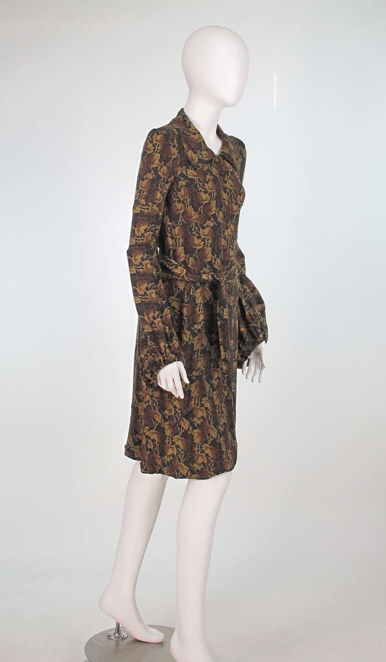 Biba balloon sleeve fitted day dress in shades of brown, from the 1960s...English ivy printed challis...Classic Biba style, narrow fitted shape dress buttons at the front with self covered buttons, modified dog ear collar at neckline...Narrow peaked