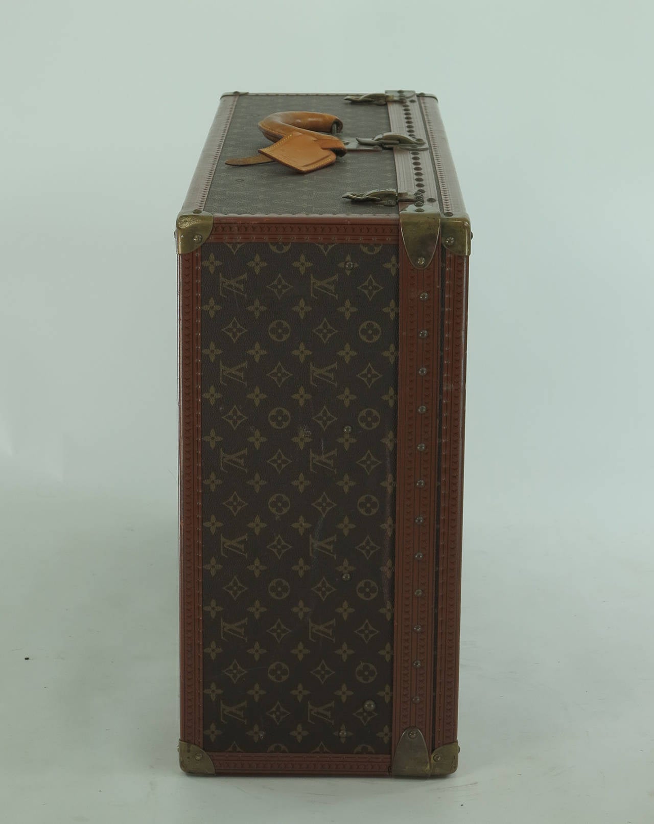 Louis Vuitton Alzar 80 monogram hardside suitcase/trunk
