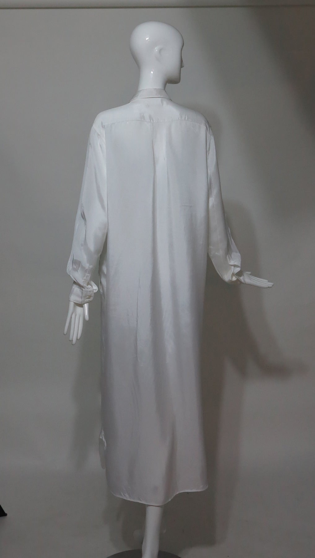 Women's Comme des Garcons sheer white nylon button front coat 1990s