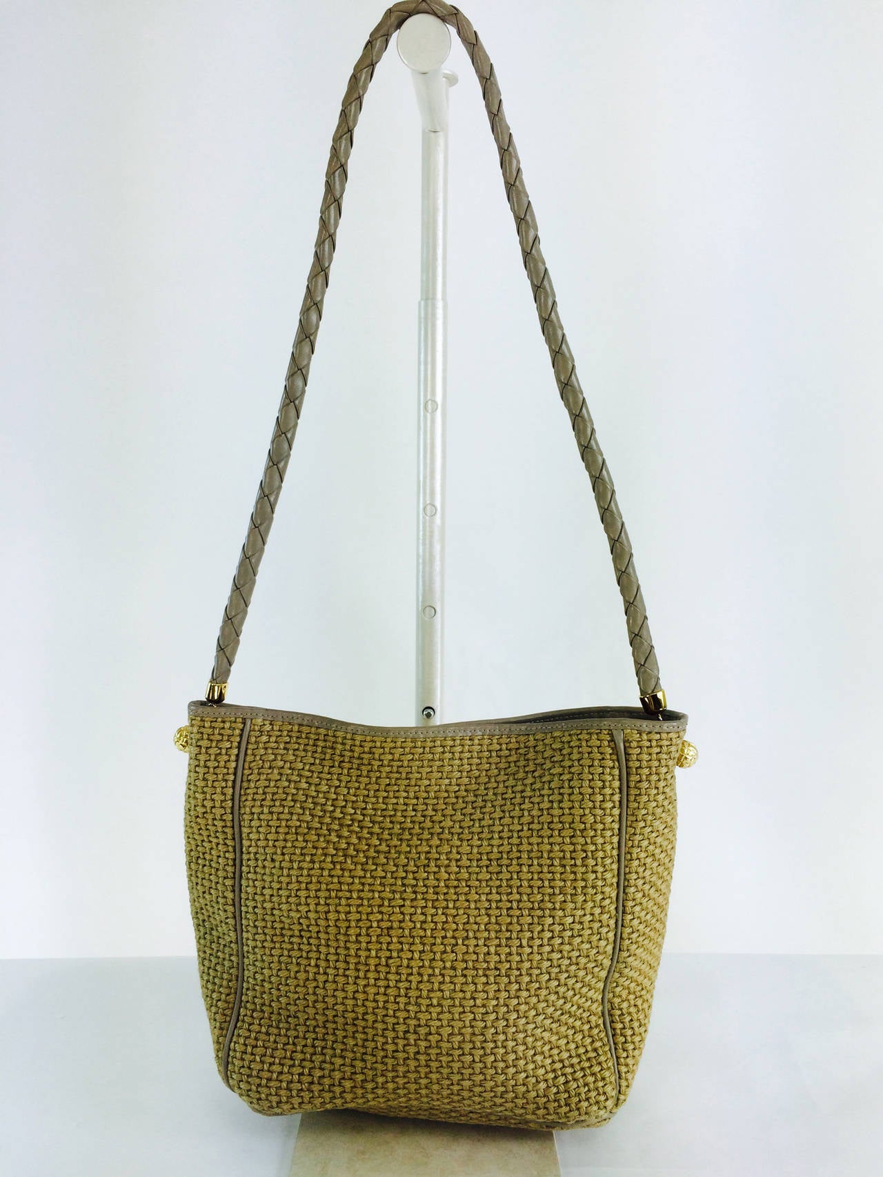 Bottega Veneta neutral woven jute & leather shoulder bag, woven leather shoulder strap, with leather cording on the body of the bag...Gold trimmings...Facings lined in leather, body of interior lined in coated fabric...There is a side zipper