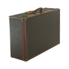 Louis Vuitton Alzar 80 monogram hardside suitcase/trunk