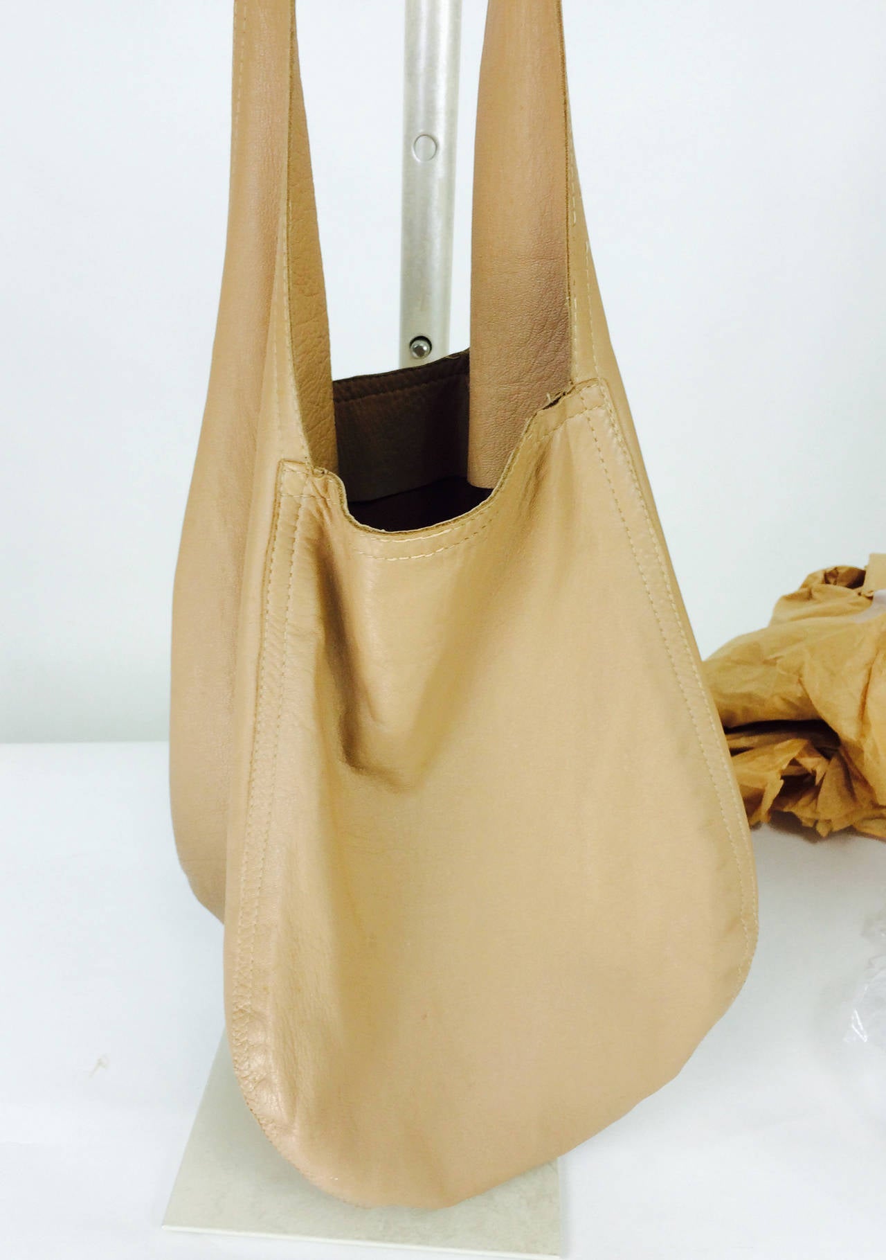 Halston fawn soft leather shoulder bag cover feature WWD Nov. 4, 1974 1
